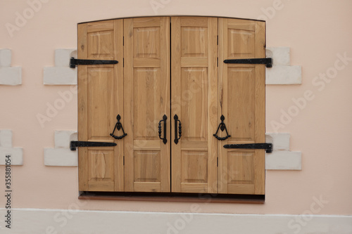 Obraz na plátně wooden oak swing doors in the old style