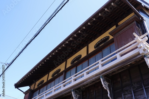 Japanese old style Architecture with yellow wall and big windows at Kamakura  Japan. A Taisenkaku  Japanese inn. Kamakura Important structure.