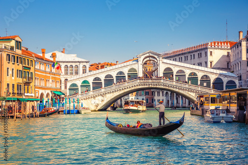 Gondola on Grand canal near Rialto bridgein Venice, Italy © sborisov
