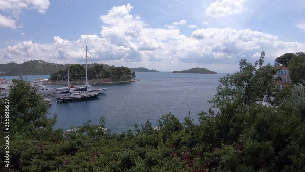 View over Skiathos and its old port, Skiathos island, Sporades, Greece. Island is a popular tourist destination for both local and foreign tourists. View over Skiathos and its old port, Skiathos island, Sporades, Greece. Island is a popular tourist destination for both local and foreign tourists.