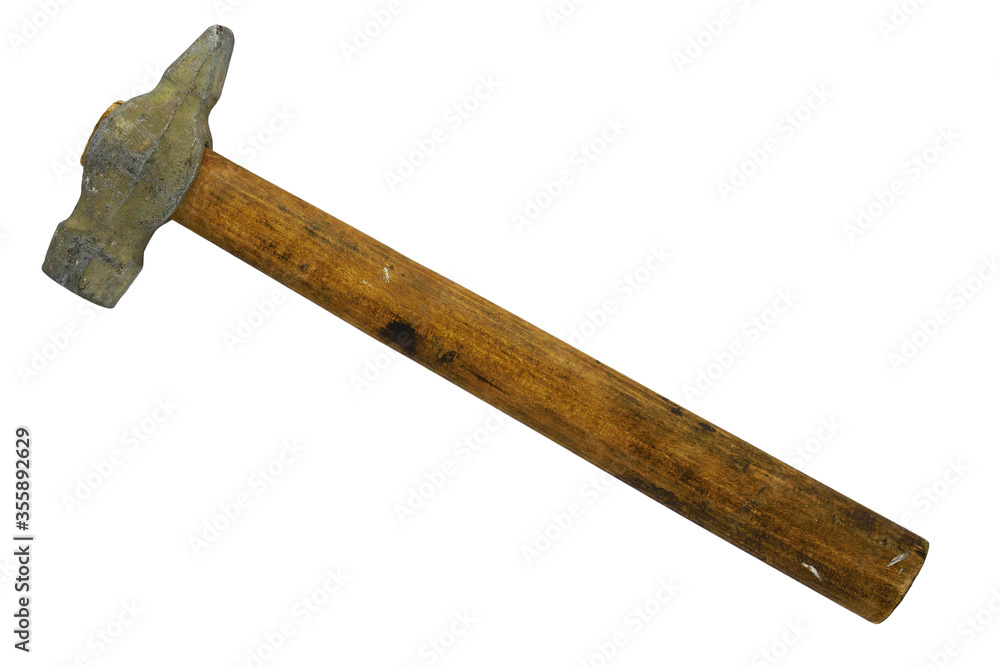 Old used and worn locksmith's hammer with metal head and dirty wooden handle, isolated on a white background. Closeup. Copy space Old used and worn locksmith's hammer with metal head and dirty wooden handle, isolated on a white background. Closeup. Copy space