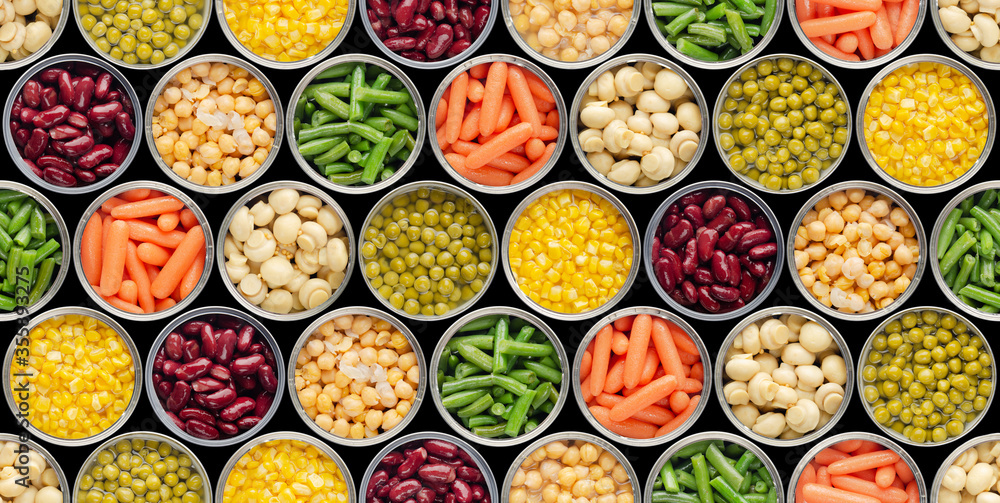 Seamless food background made of opened canned chickpeas, green sprouts, carrots, corn, peas, beans and mushrooms on black background Seamless food background made of opened canned chickpeas, green sprouts, carrots, corn, peas, beans and mushrooms on black background