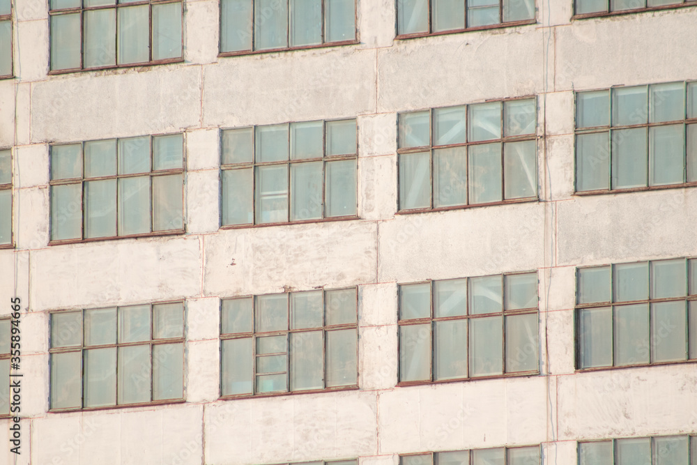 Large blue repeating building windows close-up background Large blue repeating building windows close-up background