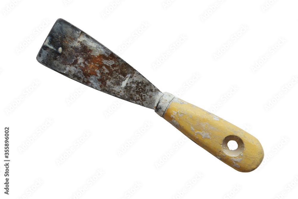 Dirty rusty spatula with wooden handle isolated on a white background. Used small putty knife stained with old plaster, rust and sealant. Closeup. Copy space Dirty rusty spatula with wooden handle isolated on a white background. Used small putty knife stained with old plaster, rust and sealant. Closeup. Copy space