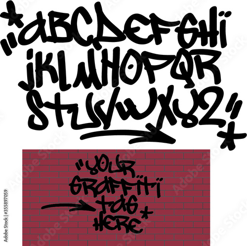 Spray graffiti tagging font and signs (star, arrow, dot, quotation mark). ''Your graffiti tag here''  quote on brick wall background.