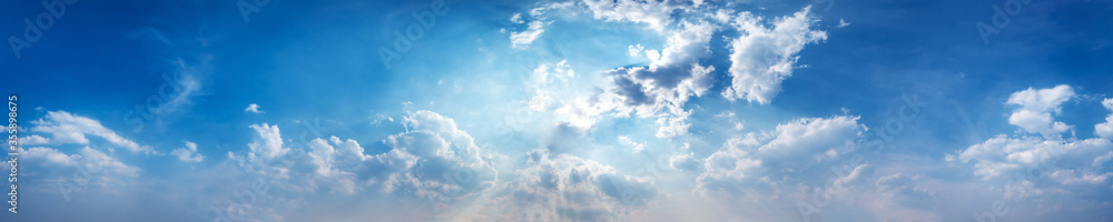 Panorama sky with beautiful cloud on a sunny day. Panoramic high resolution image. - obrazy, fototapety, plakaty 