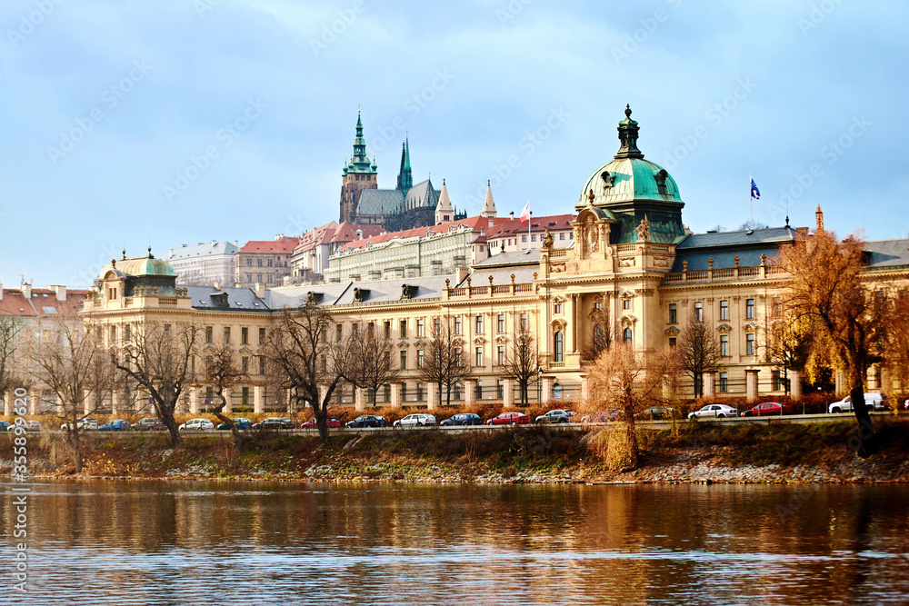 View to the Prague Government Office and Prague Castle from the Vltava river. Famous place in the Czech Republic, ancient Hradcany hill with the president office and Straka academie