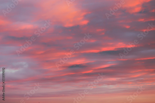 Orange sky background at sunset © yta
