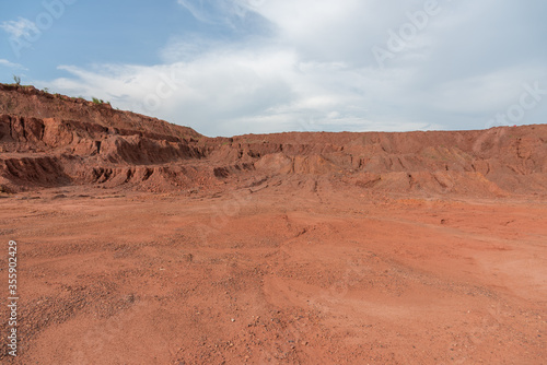 Sandy gravel ground surface and earth slope on construction land