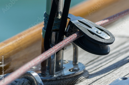 Fotografija snatch block and ropes on deck Sailing yacht.