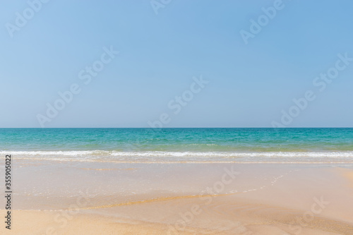 tropical landscape beach sea with blue sky background in Mai Khao Beach,Phuket, Thailand .-Summer Concept