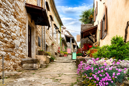 Hum is a town in Istria  about 14 kilometers from Buzet. The town  where only 30 people live  is called the  smallest town in the world .