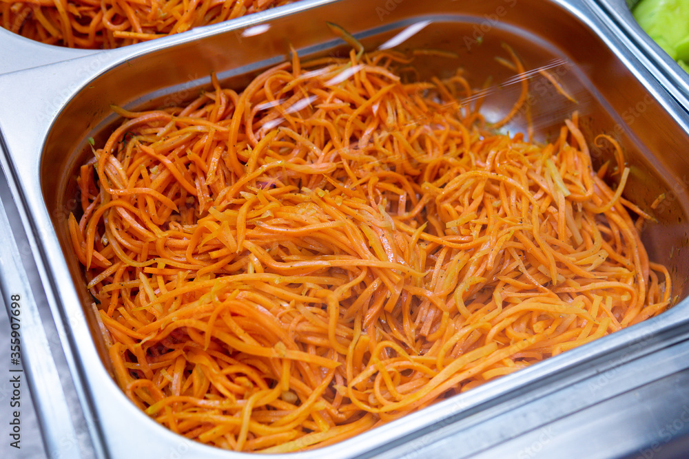 Korean spicy carrot salad on the market Korean spicy carrot salad on the market