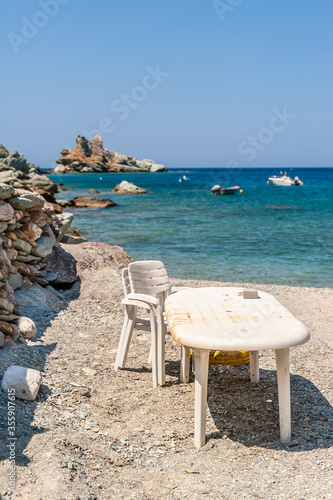Table and chair by the sea