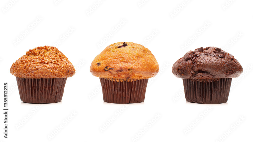 Raisin bran, blueberry and double chocolate muffins on white. Raisin bran, blueberry and double chocolate muffins on white.