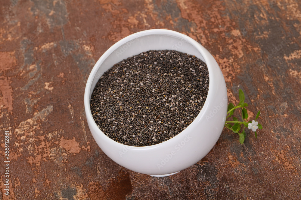 Dietary Chia seeds in the bowl Dietary Chia seeds in the bowl