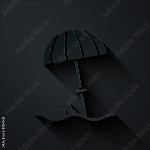 Paper cut Sun protective umbrella for beach icon isolated on black background. Large parasol for outdoor space. Beach umbrella. Paper art style. Vector Illustration