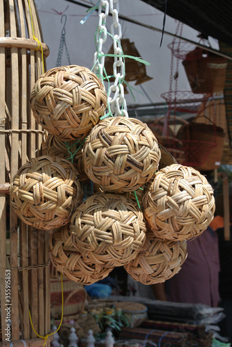 Sepak takraw ball made of woven rattan displayed for sale.