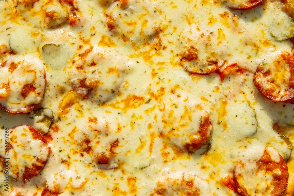 background of hot pizza with cheese top view, texture. homemade food background of hot pizza with cheese top view, texture. homemade food