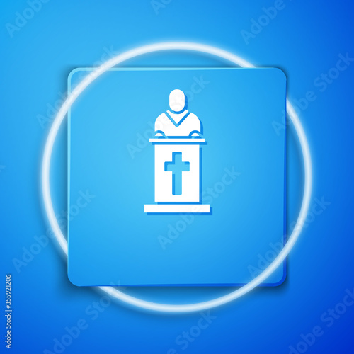 White Church pastor preaching icon isolated on blue background. Blue square button. Vector Illustration