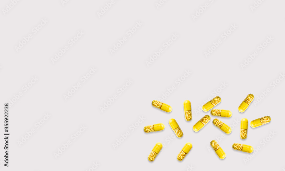 Pills drugs medicine tablets on a white background
