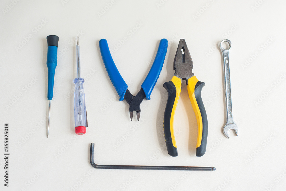A set of tools on a light background A set of tools on a light background