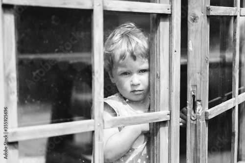 Little girl playing. Monochrome portrait © Jan