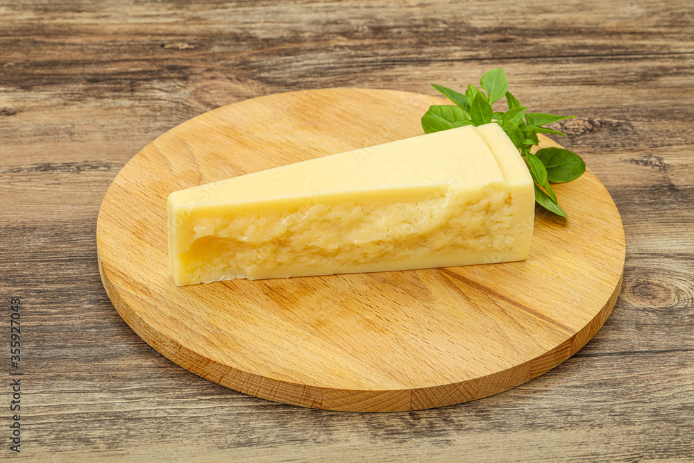 Hard parmesan cheese served basil Hard parmesan cheese served basil