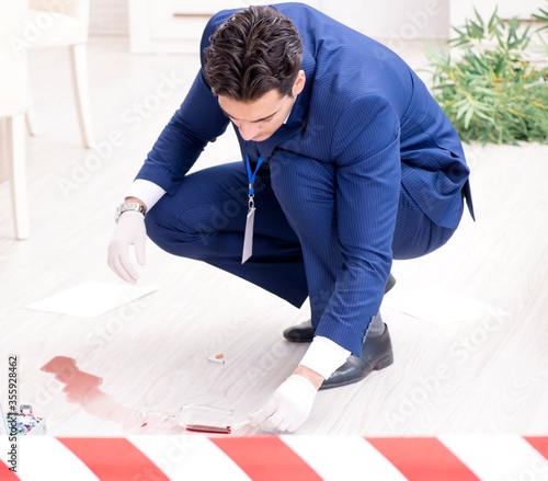 Forensics investigator at the scene of office crime