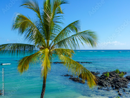 Turquoise beach view on the Indian Ocean in Grand Baie, Mauritius Island