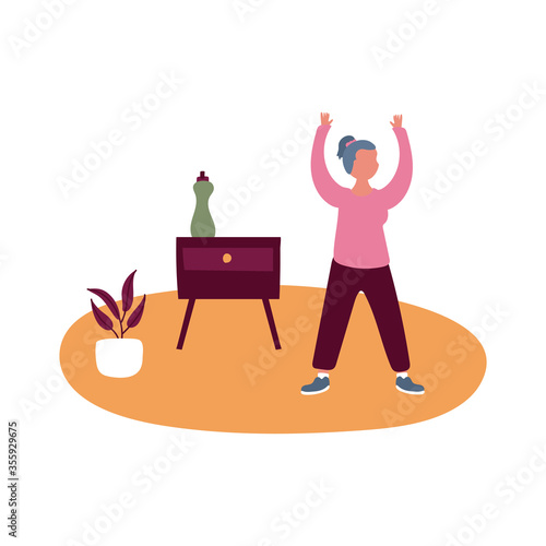 eldery woman practicing exercise in home activity free form style