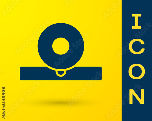 Blue Otolaryngological head reflector icon isolated on yellow background. Equipment for inspection the patient s ear, throat and nose. Vector Illustration