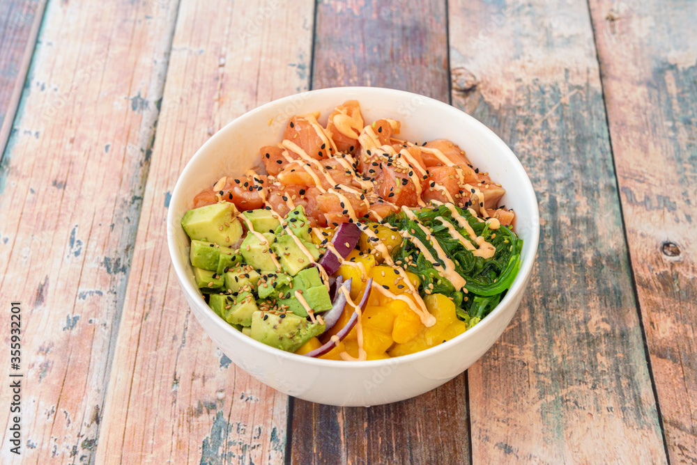 Hawaiian Poke Bowl on wooden table Hawaiian Poke Bowl on wooden table