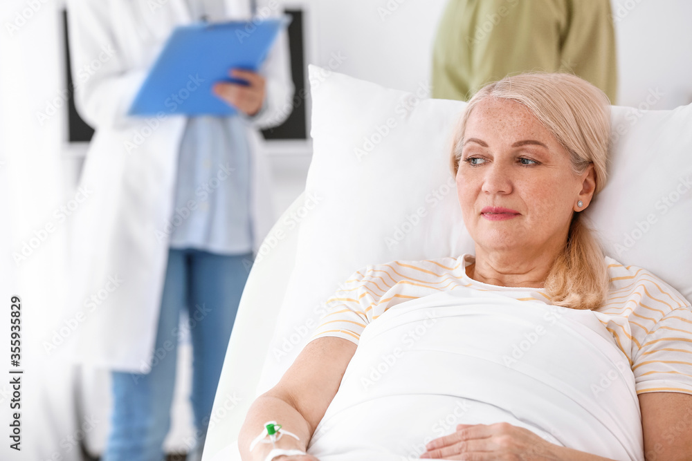 Fototapeta premium Mature woman in hospital room