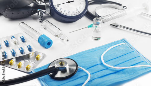 Bild auf Leinwand Medical equipment syringe, antibiotic, stethoscope and pills