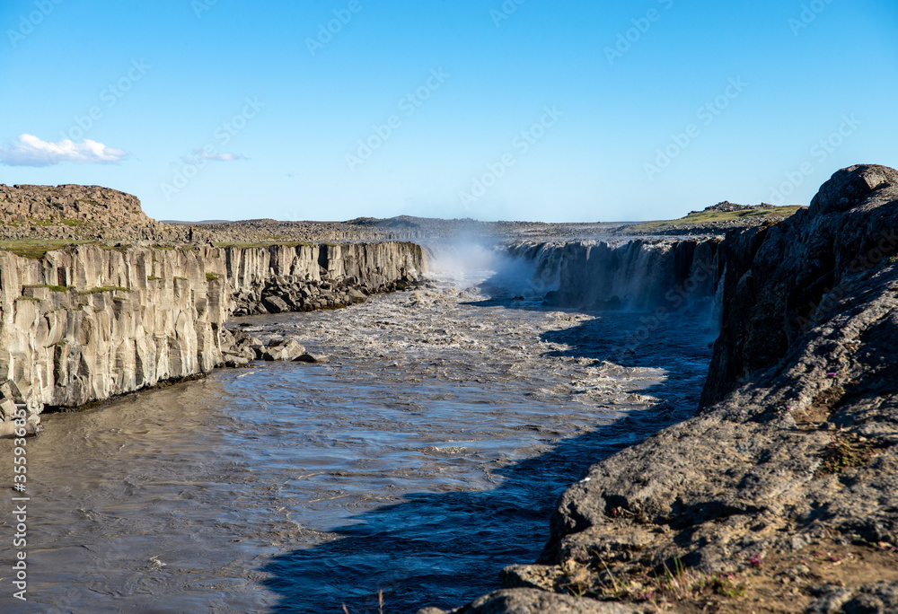  Dettifoss is the most powerful waterfall on Iceland . It is located in Jokulsargljufur National Park the northeasten Iceland on the river Jokulsa a Fjollum.