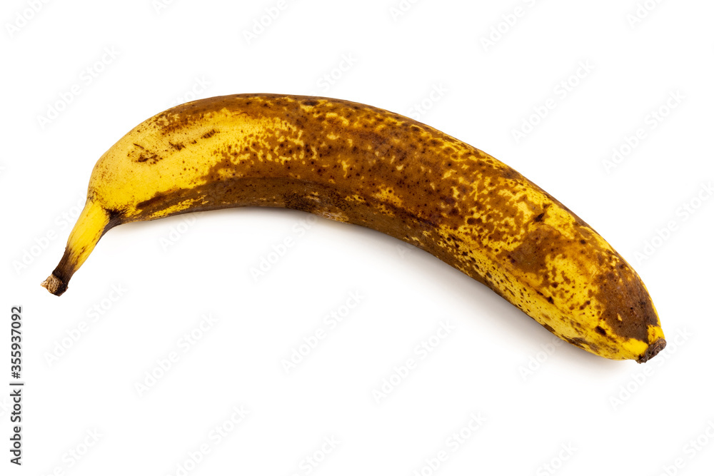 Overripe banana with shadow isolated