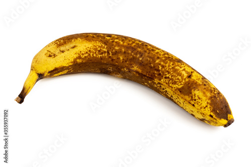 Overripe banana with shadow isolated