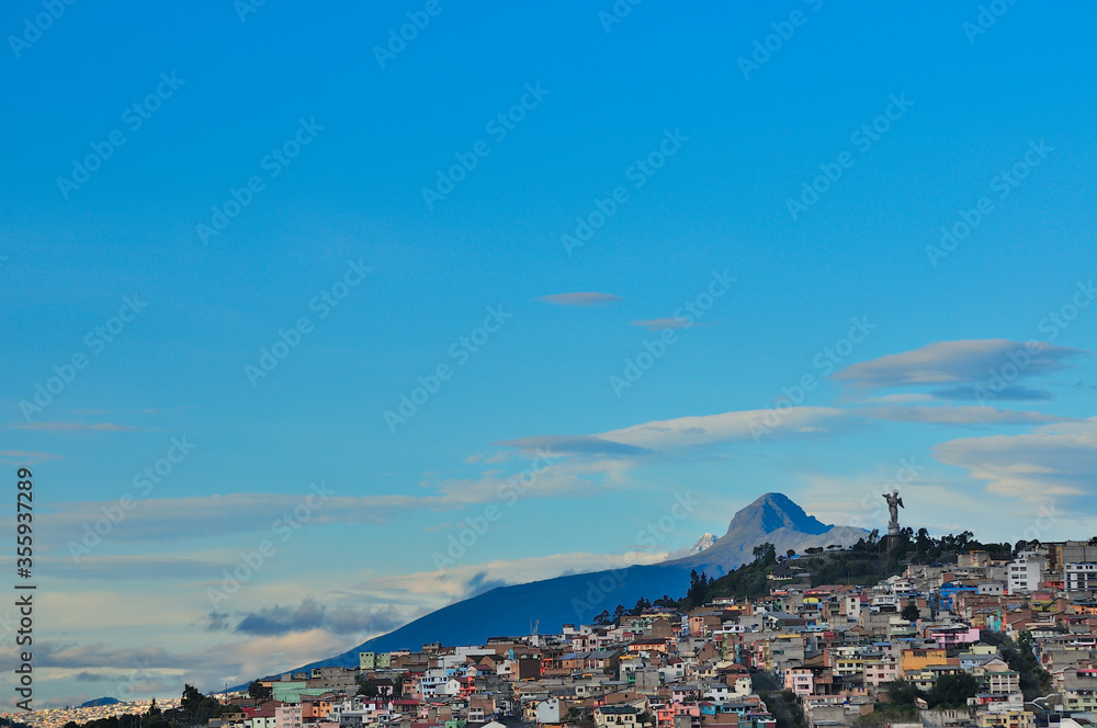 View of the city of Quito with the Panecillo and the El Corazón volcano in the background