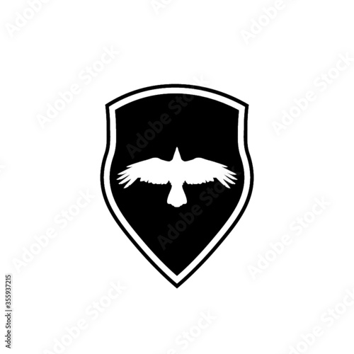 Silhouette raven bird. Crow shield design flat animal illustration isolated on white background