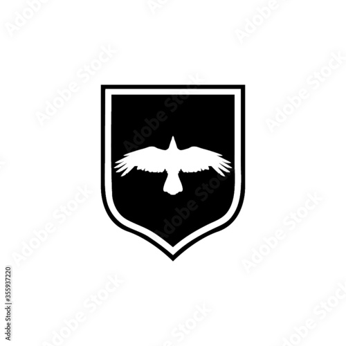 Silhouette raven bird. Crow shield design flat animal illustration isolated on white background