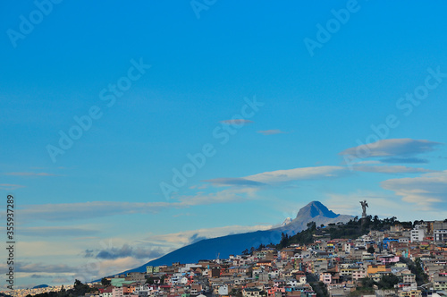 View of the city of Quito with the Panecillo and the El Corazón volcano in the background © fabricio