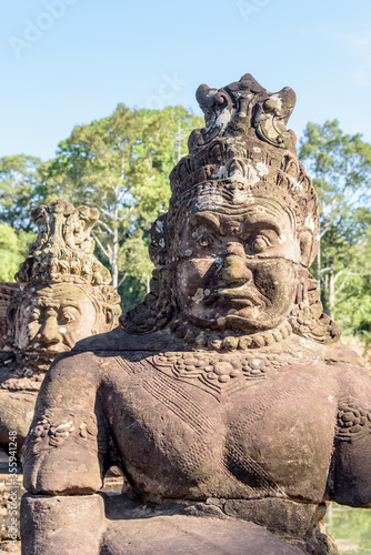 Stone Statue at the South Bayon Gate to Bayon Temple at the Angkor Wat Complex Near Siem Reap Cambodia