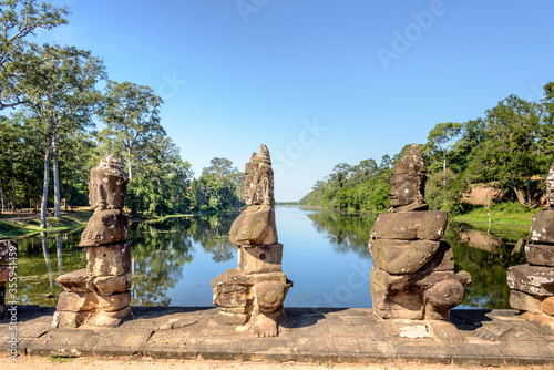 Stone Statue at the South Bayon Gate to Bayon Temple at the Angkor Wat Complex Near Siem Reap Cambodia