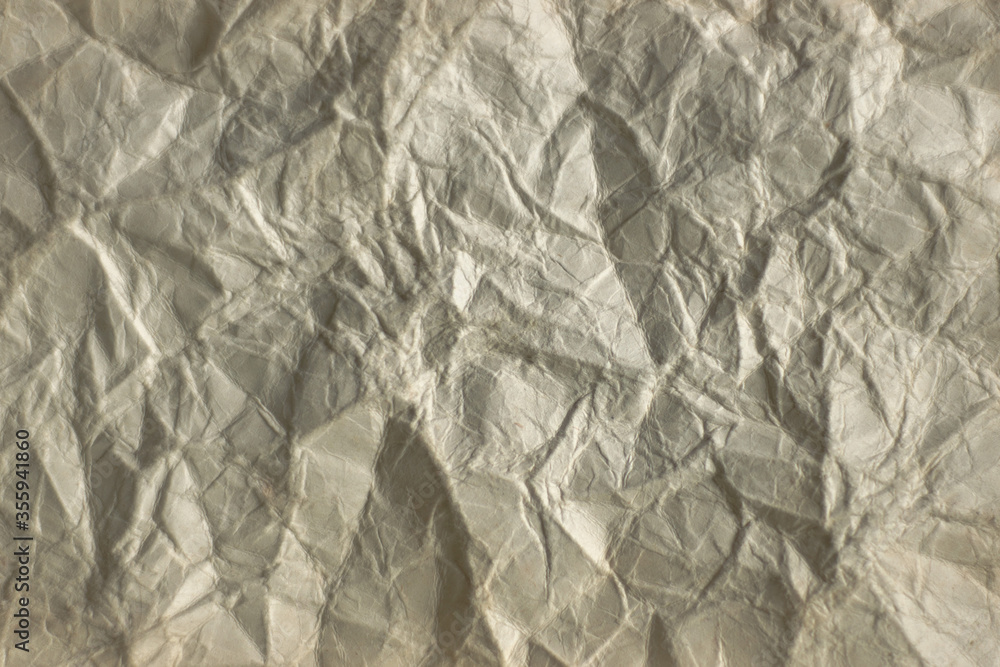 wrinkled sheet of old paper close, soft focus wrinkled sheet of old paper close, soft focus
