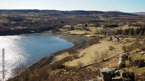 Ben Tianavaig mountain hike in the Scottish Highlands on a sunny afternoon on the Isle of Skye, United Kingdom. photo