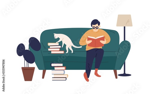 Enthusiastic guy reading book sitting on couch vector flat illustration. Literature lover resting at home surrounded by textbook stacks isolated on white. Male in glasses preparing to examination