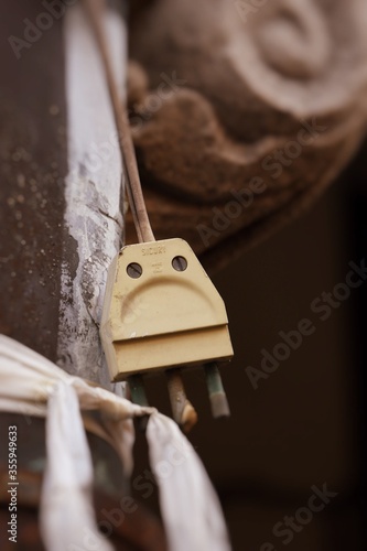 electric plug that looks very sad