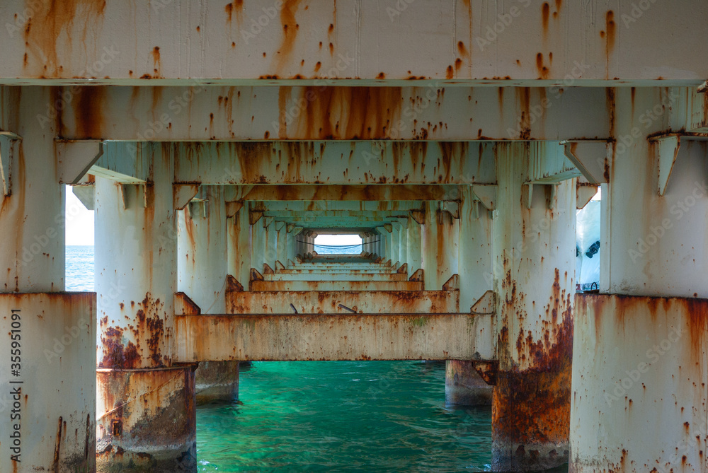 View of sea under the old pier View of sea under the old pier