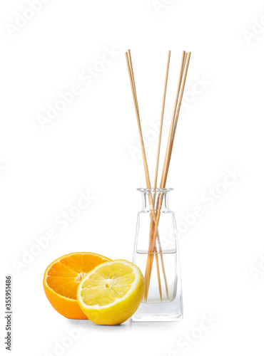 Obraz na płótnie Citrus reed diffuser on white background